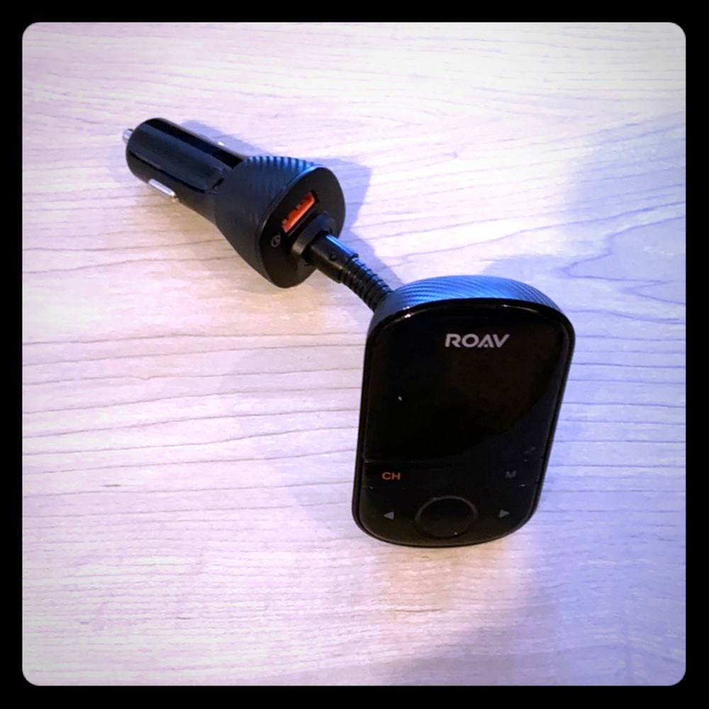 Bluetooth car adapter w/ double outlets and voice.